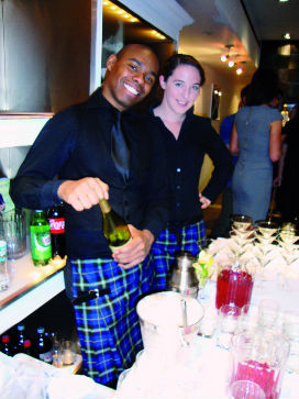 Bar staff at Get Kilted in New York wearing Kilty Aprons made from the Italian National Tartan by Clan Italia