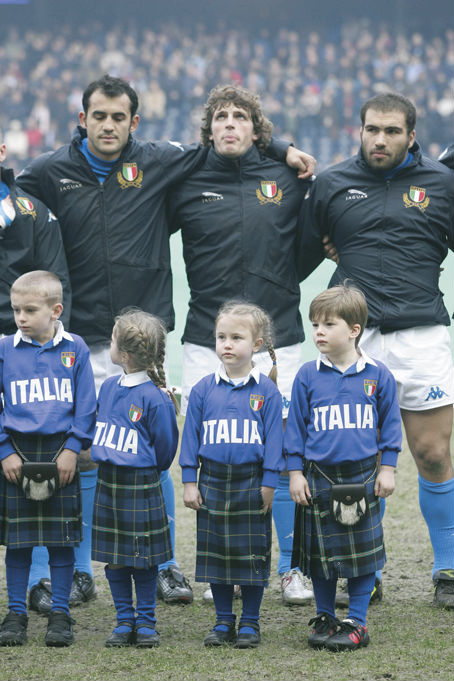 Italian Rugby Team players with mascots dressed in the Italian National Tartan kilts at Murrayfield 2005 for the RBS Six Nations