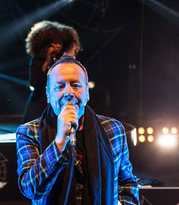 Jim Kerr wearing Italian National Tartan jacket on Simple Minds tour in Lisbon